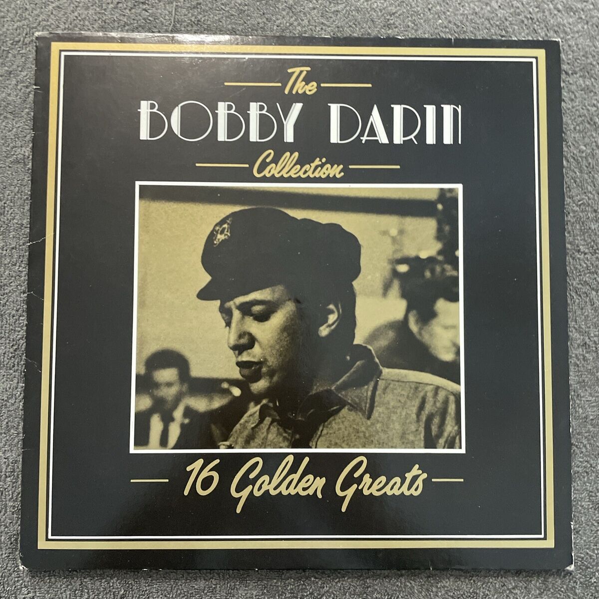 Album cover of 'The Bobby Darin Collection: 16 Golden Greats' with a black border and portrait of Bobby Darin.